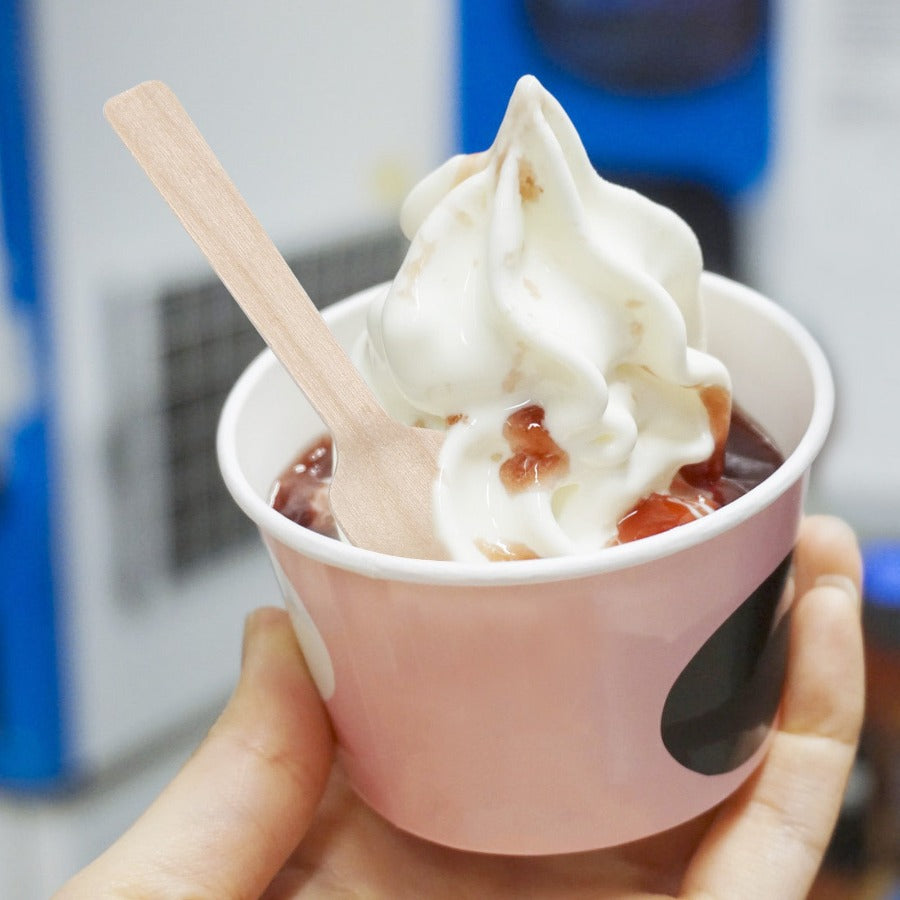 ice cream bowl and wood spoon